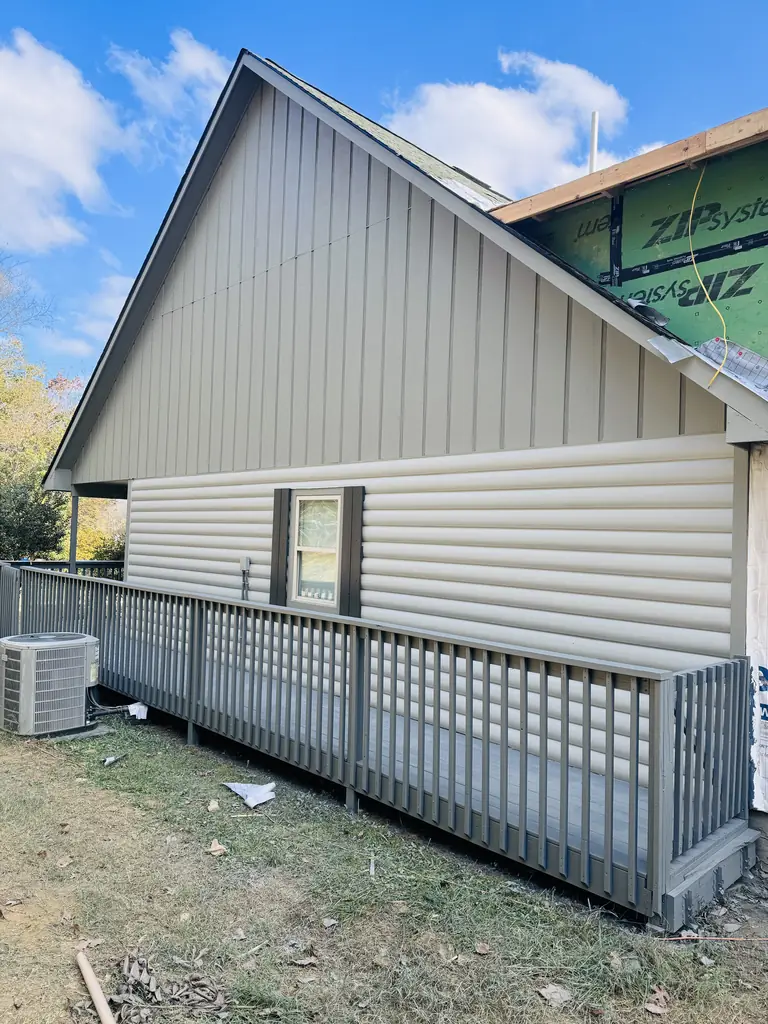 Porch railing and skirting painted gray