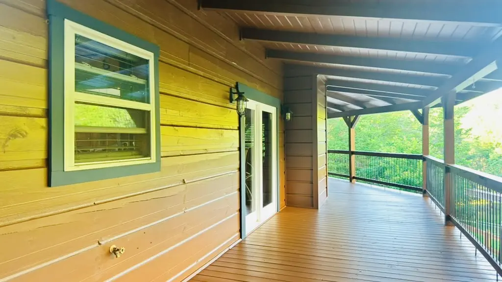 Wood porch and siding stained