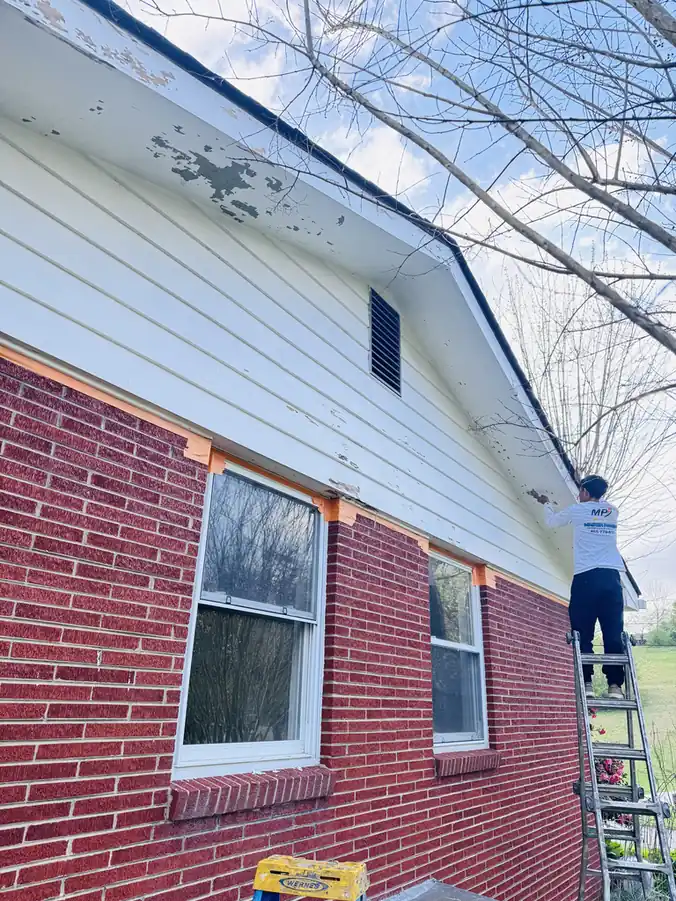 Step 03: prep comes first on a Master Painting LLC job in Knoxville, Tennessee